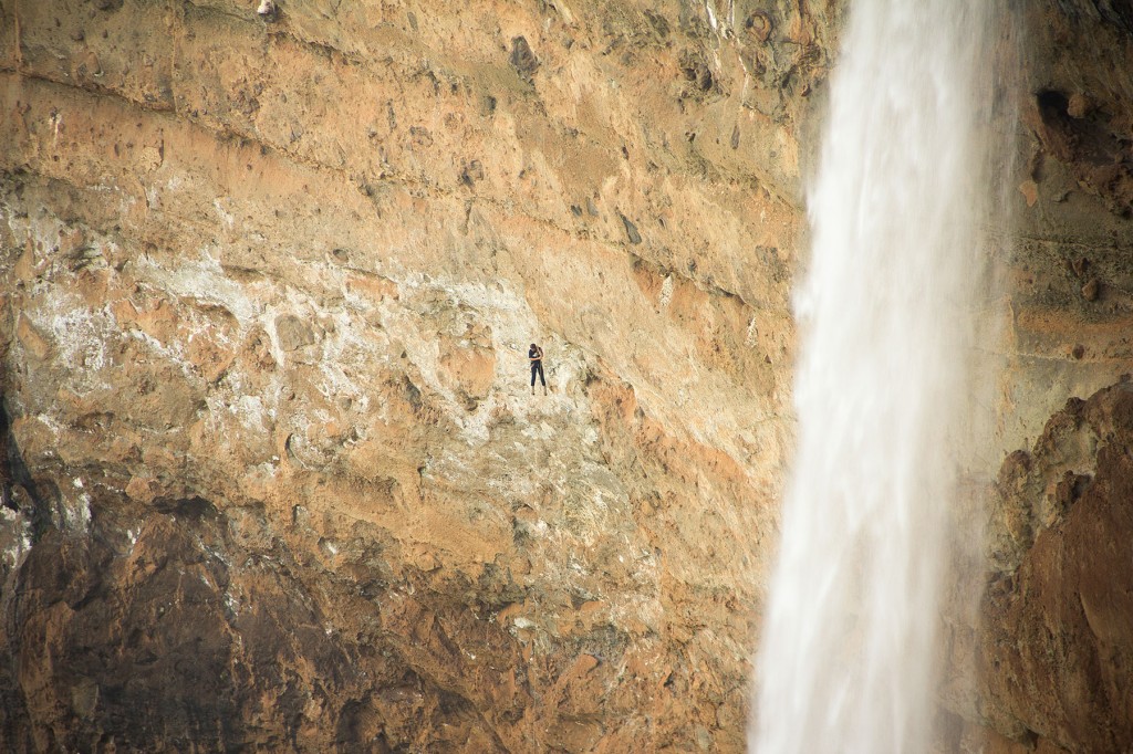 Charles rappelling down Sipi Falls